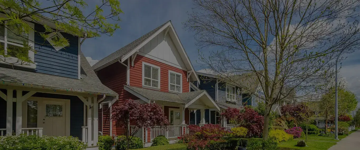 Colorful residential homes representing Edmonton house painting services