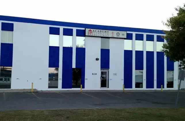 Industrial and warehouse painting project in Edmonton featuring updated exterior metal siding.