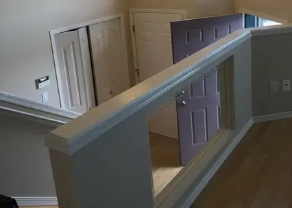 Interior residential painting in Edmonton showing freshly painted walls and trim work.